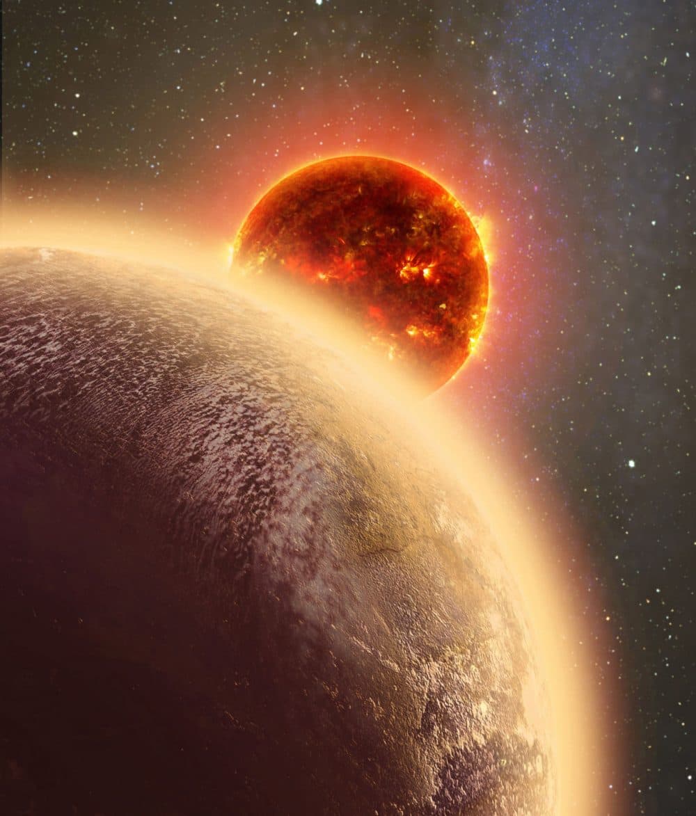 This artist's conception shows GJ 1132b, a rocky planet similar to the Earth in size and mass, orbiting a red dwarf star. (Dana Berry/SkyWorks/NASA via AP)