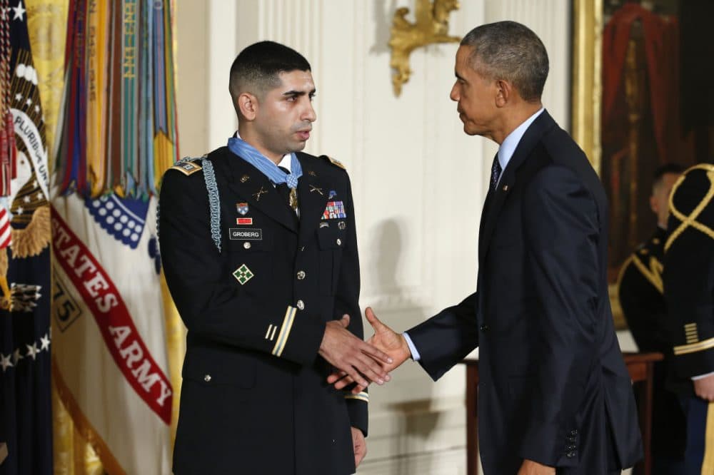 Florent Groberg shakes President Obama's hand during a ceremony where he was awarded the nation's highest honor for battlefield bravery in Iraq or Afghanistan. (Pablo Martinez Monsivais/AP)