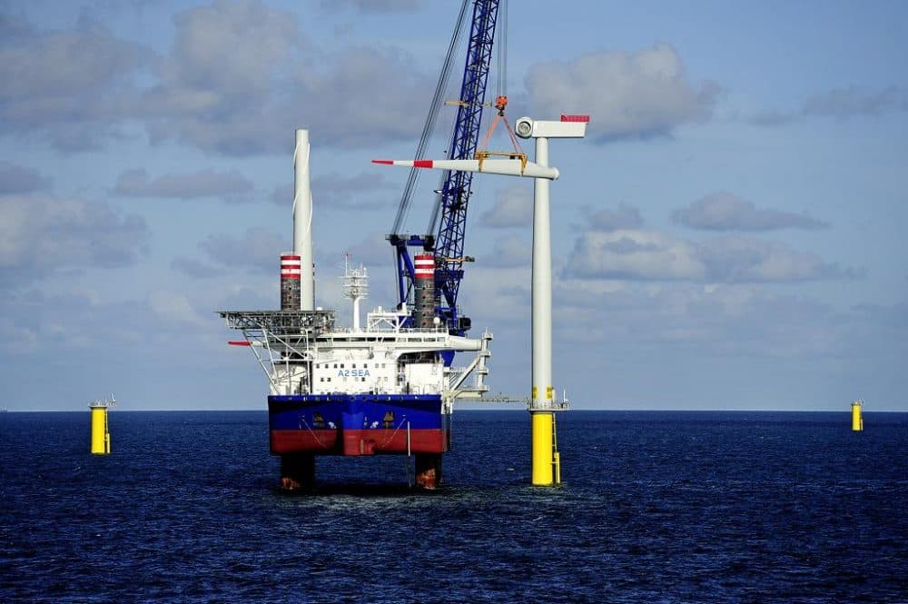 DONG Energy installs wind turbine blades in the German North Sea at the Borkum Riffgrund 1 power plant, which opened in October. The Danish company is proposing to build an offshore wind farm south of Martha's Vineyard. (Courtesy of DONG Energy)