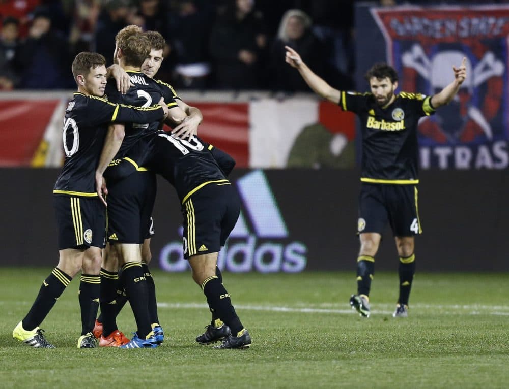 HARRISON, NJ - NOVEMBER 29: Members of the Columbus Crew celebrate their Eastern Conference win over the New York Red Bulls after their match at Red Bull Arena on November 29, 2015 in Harrison, New Jersey. (Photo by Jeff Zelevansky/Getty Images)