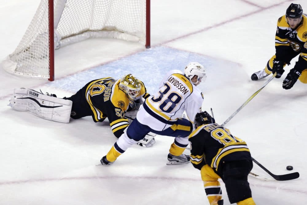 Nashville Predators right wing Viktor Arvidsson (38) eludes Boston Bruins goalie Jonas Gustavsson (50) as he sets up the game winning goal during last night's game. (Charles Krupa/AP)