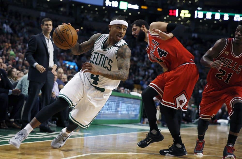 Boston Celtics' Isaiah Thomas (4) drives past Chicago Bulls' Nikola Mirotic (44) during last night's game. The Celtics won 105-100. (Michael Dwyer/AP)