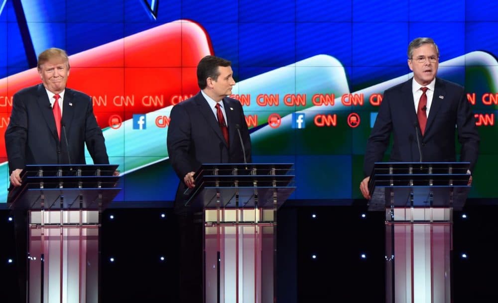 Republican presidential candidate former Florida Gov. Jeb Bush (right) speaks as businessman Donald Trump (left) gestures and Texas Sen. Ted Cruz (center) looks on during the Republican Presidential Debate, hosted by CNN, at The Venetian Las Vegas on December 15, 2015 in Las Vegas, Nevada. (Robyn Beck/AFP/Getty Images)
