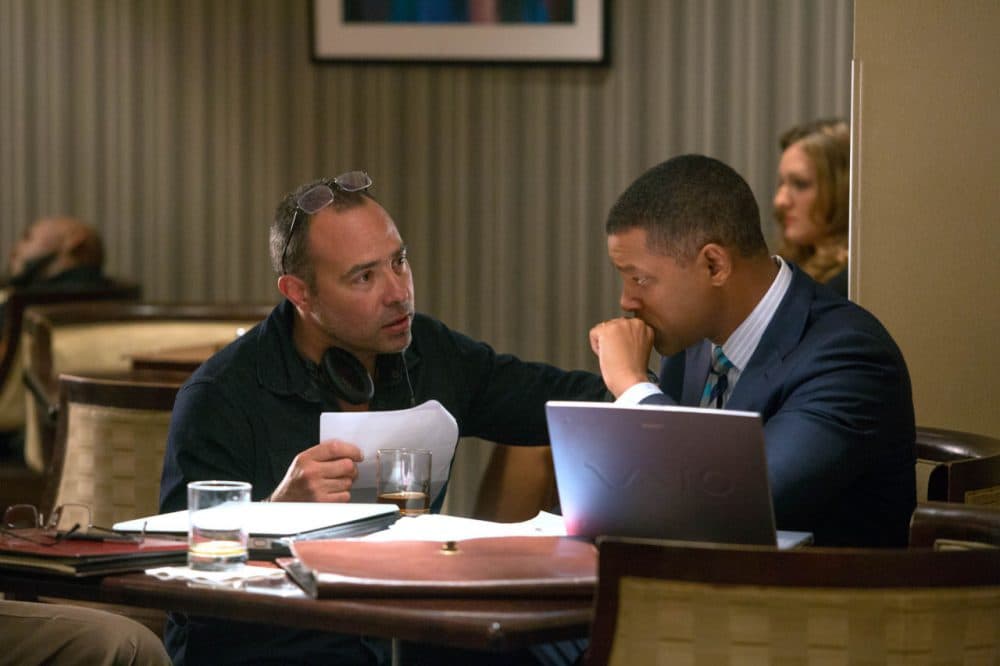 Director Peter Landesman, left, and Will Smith on set of Columbia Pictures' "Concussion."