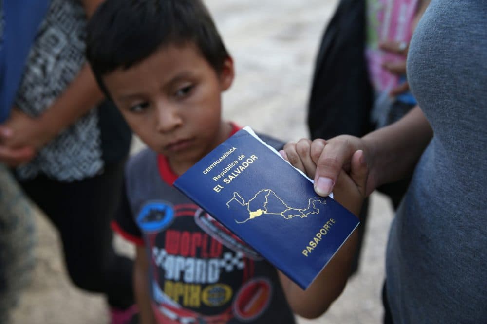 Families of Central American immigrants turn themselves in to U.S. Border Patrol agents after crossing the Rio Grande River from Mexico on September 8, 2014 in McAllen, Texas. (John Moore/Getty Images)