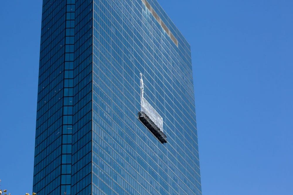 Graffiti artist JR's mural on the side of the former John Hancock building. (Jesse Costa/WBUR)