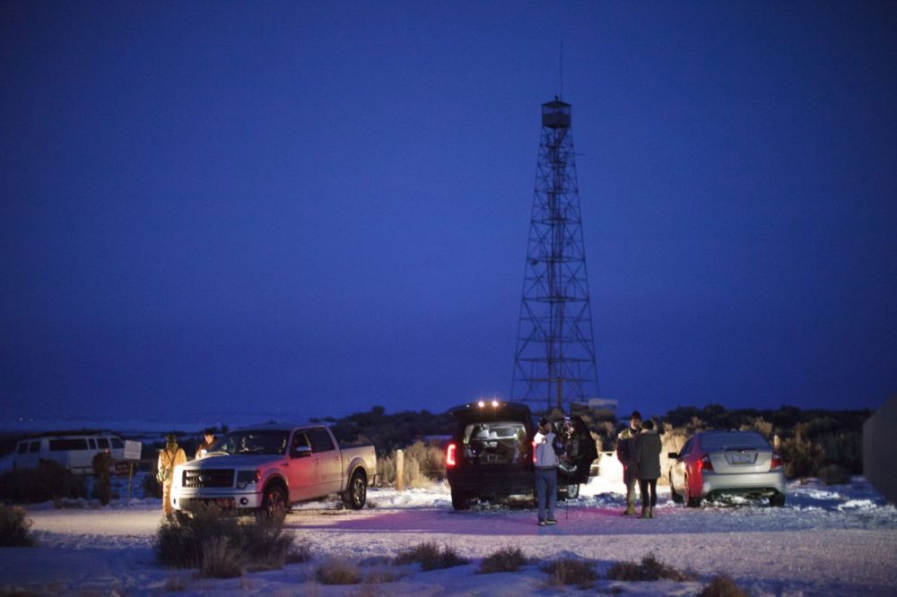 Members of an armed anti-government group at the entrance to the Malheur Wildlife Refuge Headquarters property some 30 miles from Burns, Oregon, January 3, 2016. The group has taken over a building at the federal wildlife refuge, accusing officials of unfairly punishing ranchers who refused to sell their land. The occupation has prompted some schools to call off classes for the entire week. (Rob Kerr/AFP/Getty Images)