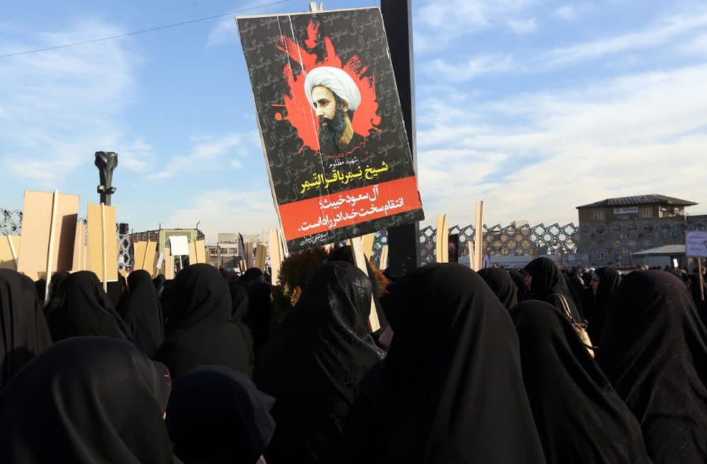 Iranian women gather during a demonstration against the execution of prominent Shiite Muslim cleric Nimr al-Nimr (portrait) by Saudi authorities, at Imam Hossein Square in the capital Tehran on January 4, 2016. Tensions between Iran and its Sunni Arab neighbors reached new heights as Saudi Arabia and Gulf allies cut or downgraded diplomatic ties with Tehran in a row over the execution of a Shiite cleric. (Atta Kenare/AFP/Getty Images)