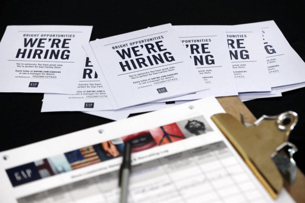 Job applications and information for the Gap Factory Store sit on a table during a job fair at Dolphin Mall in Miami, on Oct. 6, 2015. (Wilfredo Lee/AP)