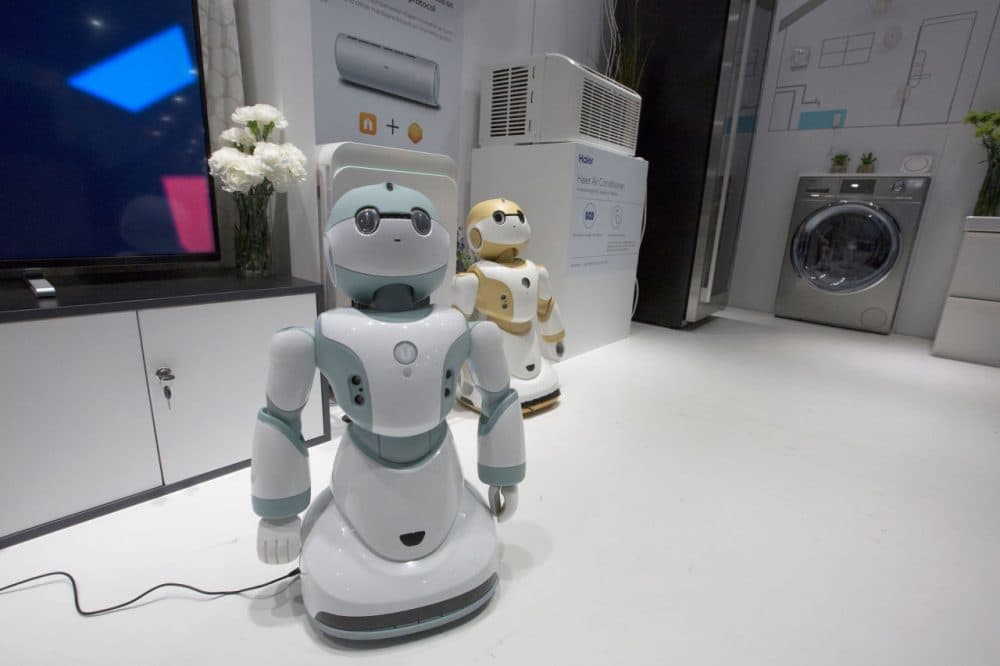 Newly unveiled Haier Ubot household robots are shown in a kitchen display at the CES 2016 Consumer Electronics Show on January 8, 2016 in Las Vegas, Nevada. (David McNew/AFP/Getty Images)