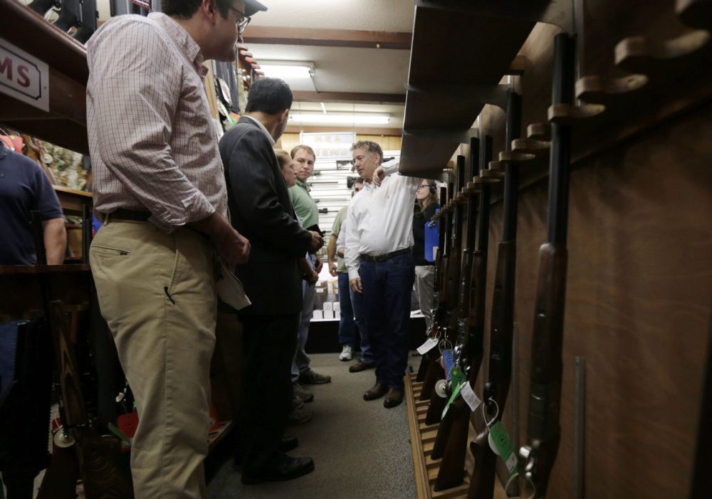 Sen. Rand Paul speaks to supporters during a campaign stop at Riley's Sport Shop in Hooksett, N.H. in August 2015. The shop is the largest gun dealer in the state, and owner Ralph Demicco helped create the New Hampshire Firearms Safety Coalition. (Charles Krupa/AP)