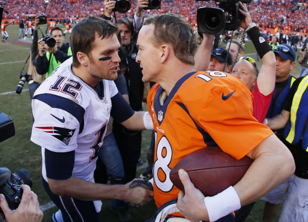 Peyton Manning and Tom Brady will go head-to-head Sunday for the 17th time of their illustrious careers. (Photo by Kevin C. Cox/Getty Images)