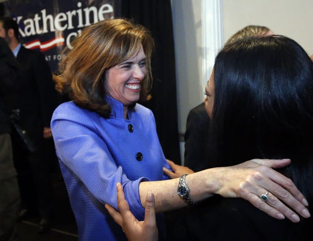 Democrat Katherine Clark greets a supporter at her election night party in Stoneham, Mass., Tuesday, Dec. 10, 2013, where she claimed victory in a special election for the vacated seat in Massachusetts' 5th Congressional District. The seat was left vacant by Edward Markey, who resigned after winning a special election to fill John Kerry's U.S. Senate seat after he had stepped down to become secretary of state. Clark defeated Republican Frank Addivinola, a Boston attorney. (AP Photo/Elise Amendola)