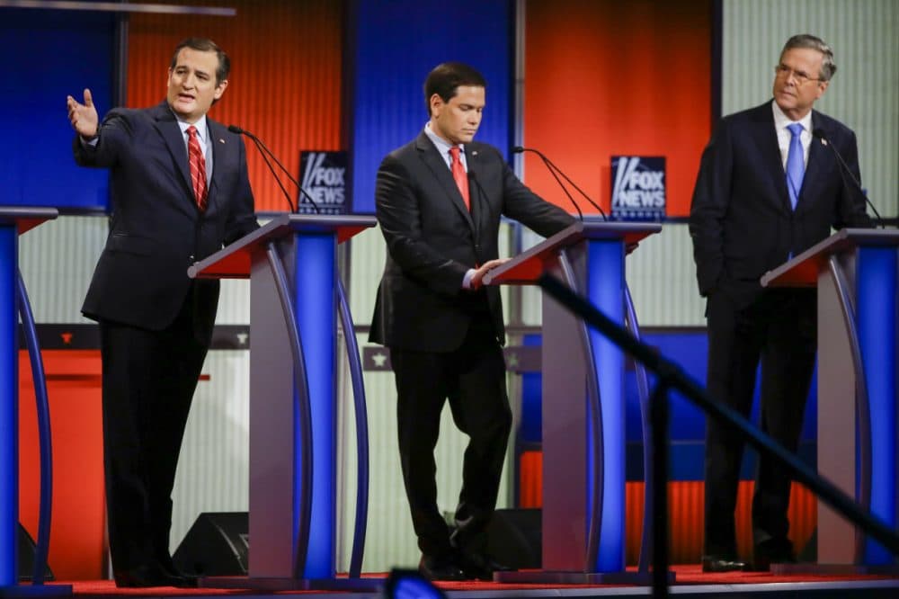 Republican presidential candidate Sen. Ted Cruz, Sen. Marco Rubio and former Florida Gov. Jeb Bush at Thursday night's Republican presidential primary debate in Des Moines, Iowa. (Charlie Neibergall/AP)