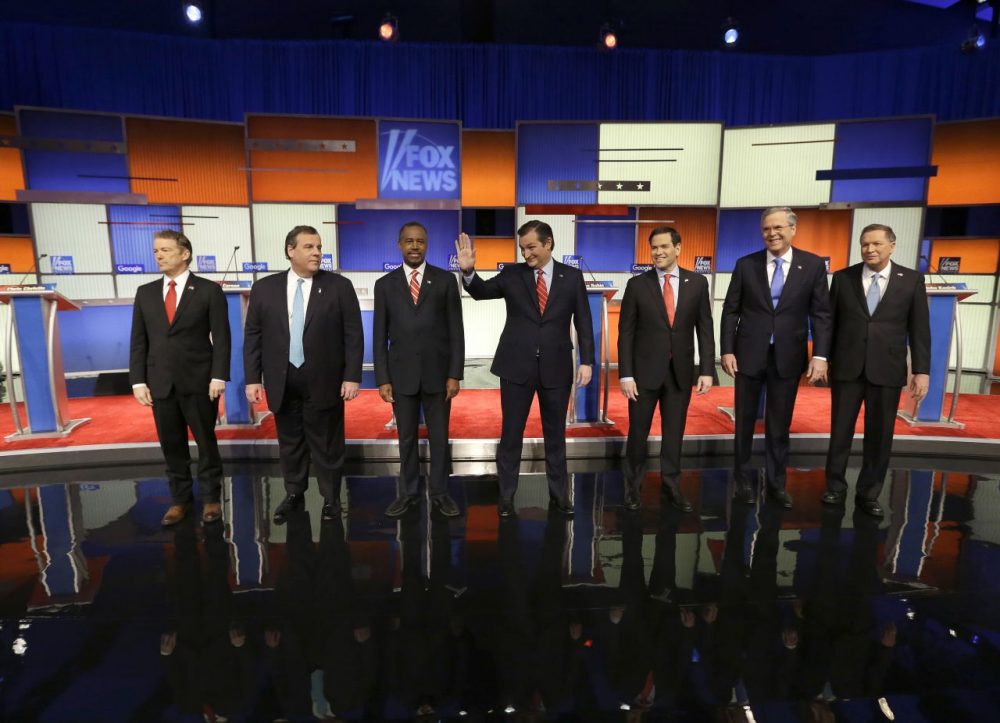 What distinguishes the campaigns that have a shot at winning some kind of “victory” in Iowa is the enthusiasm of their staff, volunteers, donors and supporters. Pictured here, Republican candidates greet the audience before a debate in Iowa Thursday night. (Chris Carlson/AP)
