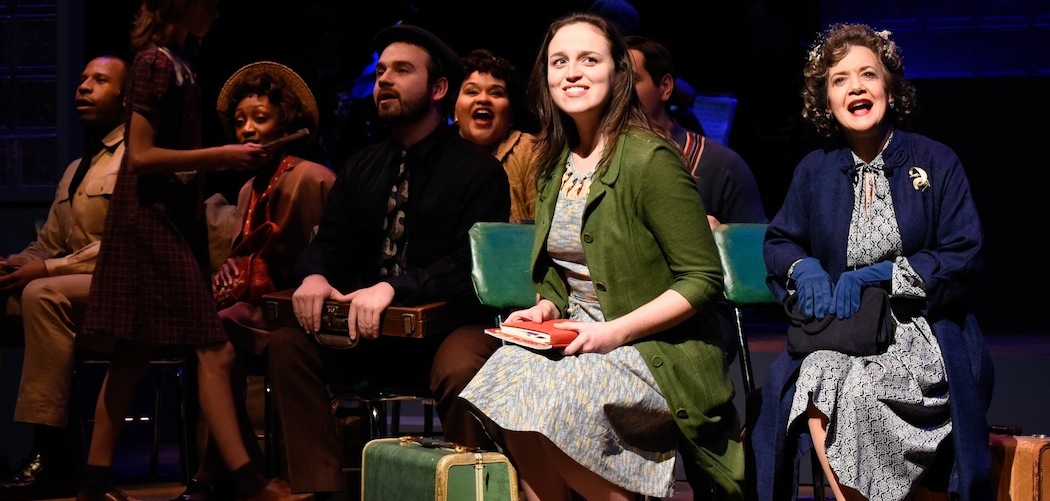 The opening bus ride number in the SpeakEasy Stage Company production of "Violet" with Alison McCartan and Kathy St. George in the foreground. (Courtesy Glenn Perry Photography/SpeakEasy Stage Company)