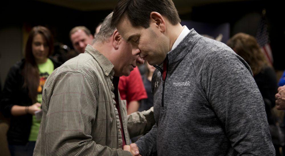 Republican presidential candidate, Sen. Marco Rubio, R-Fla., right, prays after a rally on Jan. 30, 2016, in Council Bluffs, Iowa. (Jae C. Hong/ AP)