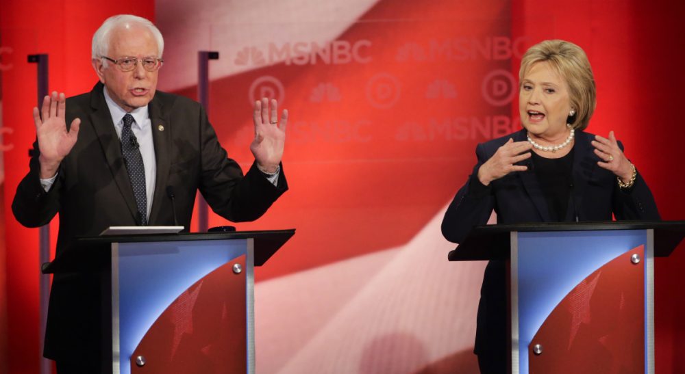 It’s not just about the nomination, Clinton and Sanders are fighting for the heart of the Democratic party. Here, the two presidential candidates debate at the University of New Hampshire Thursday. (David Goldman/ AP)