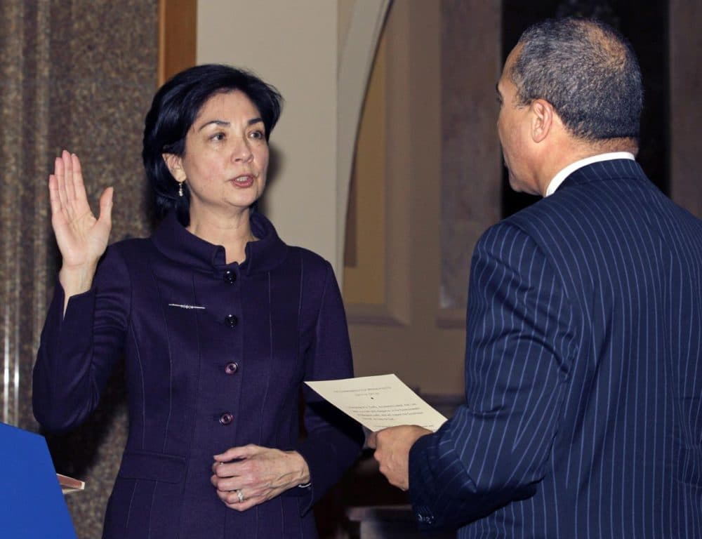 Justice Fernande "Nan" Duffly is sworn in by Mass. Gov. Deval Patrick in Boston on Feb. 17, 2011. (Elise Amendola/AP)