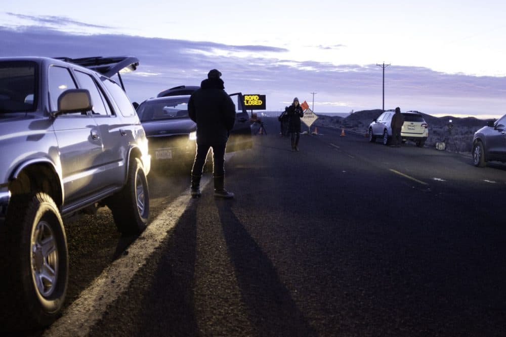 Media wait at a checkpoint about 4 miles from the Malheur Wildlife Refuge Headquarters near Burns, Oregon, on February 11, 2016.
The FBI surrounded the last protesters holed up at a federal wildlife refuge in Oregon amid reports they will surrender on Thursday, suggesting the weeks-long armed siege is approaching a climax. (ROB KERR/AFP/Getty Images)