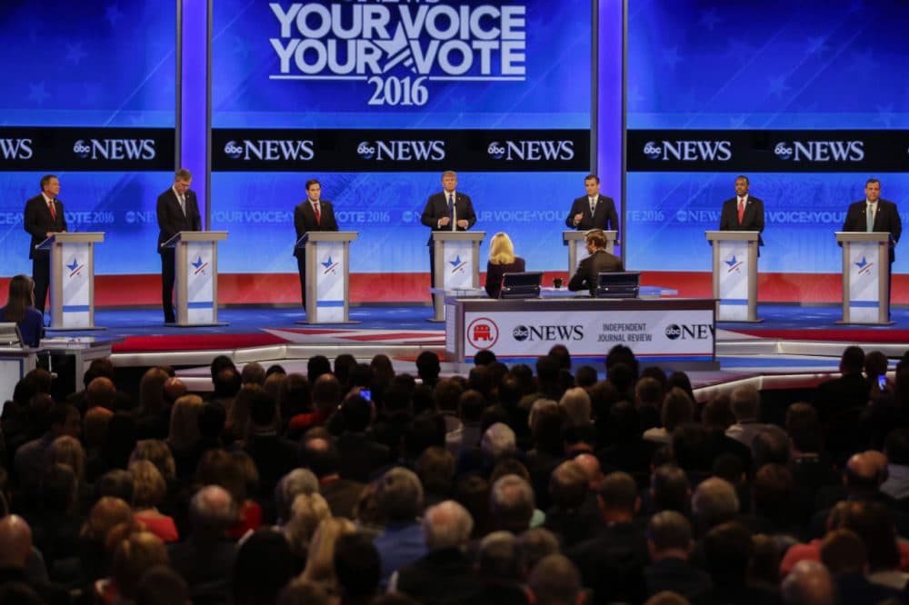 Republican presidential candidates line up on stage at the beginning of a debate hosted by ABC News at St. Anselm College Saturday in Manchester. (David Goldman/AP)