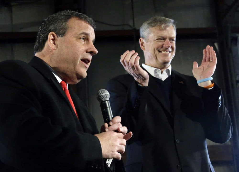 Gov. Charlie Baker -- who had endorsed Chris Christie for president -- says he's surprised Christie has now backed Donald Trump. Here, Baker appears with his fellow governor on Feb. 6 in Bedford, N.H. (Elise Amendola/AP)