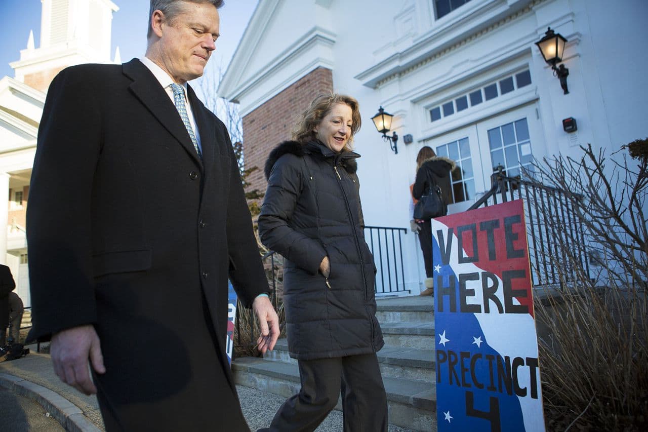 Baker and his wife, Lauren, leave the First Church in Swampscott after voting. (Jesse Costa/WBUR)