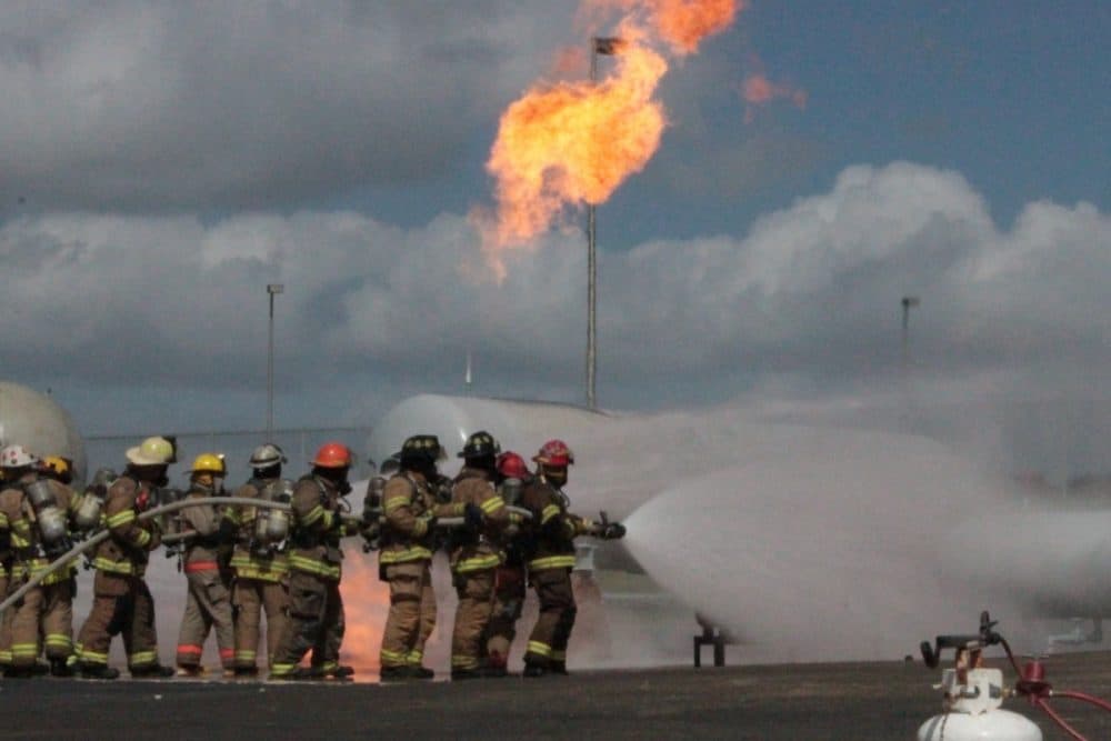 Volunteer firefighters training at Texas A&M’s Disaster City in College Station. (Dave Fehling/Houston Public Media)