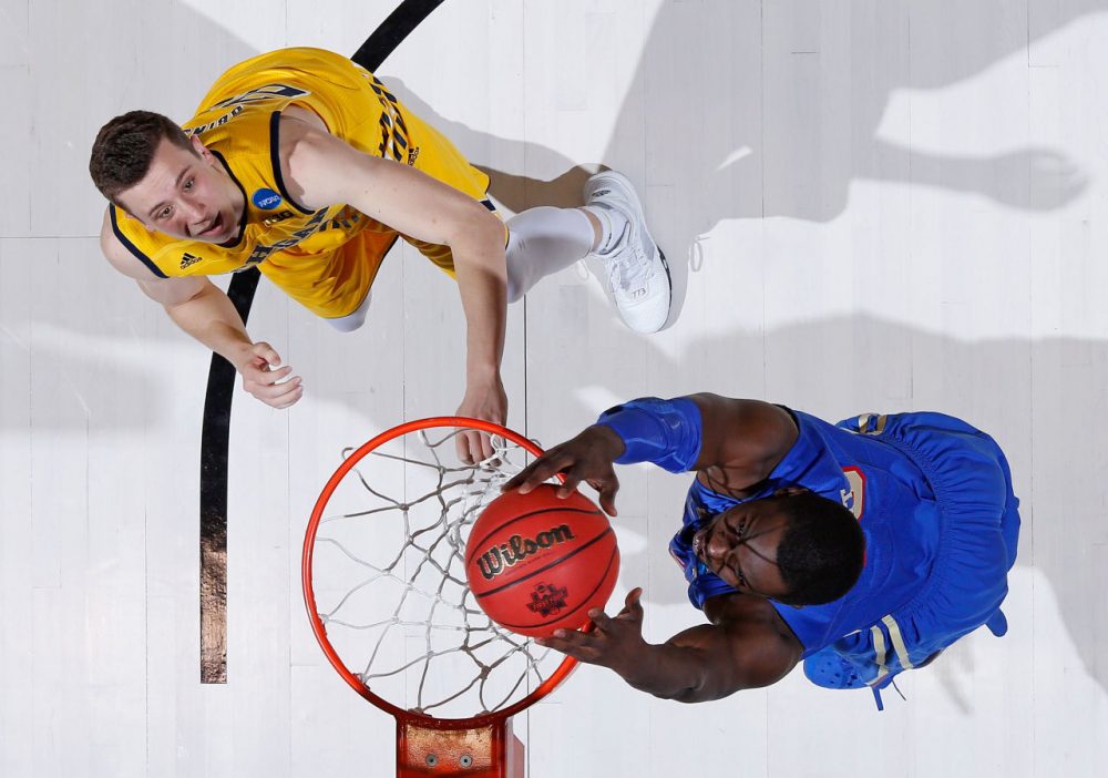 D'Andre Wright #40 of the Tulsa Golden Hurricane dunks against Sean Lonergan #20 of the Michigan Wolverines during the first round of the 2016 NCAA Men's Basketball Tournament at UD Arena on March 16, 2016 in Dayton, Ohio. (Joe Robbins/Getty Images)