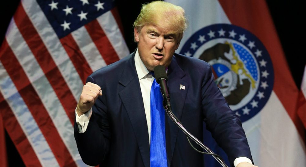 Steve Almond: "We may look back on the 2016 election as the year that White Male Privilege finally got what it’s had coming to it for more than 240 years: a drubbing at the polls." Pictured: Republican presidential candidate Donald Trump describes how he was ready to punch a person who rushed the stage during an election rally earlier in the day, as he speaks to a crowd in Kansas City, Mo., Saturday, March 12, 2016. (Nati Harnik/AP)