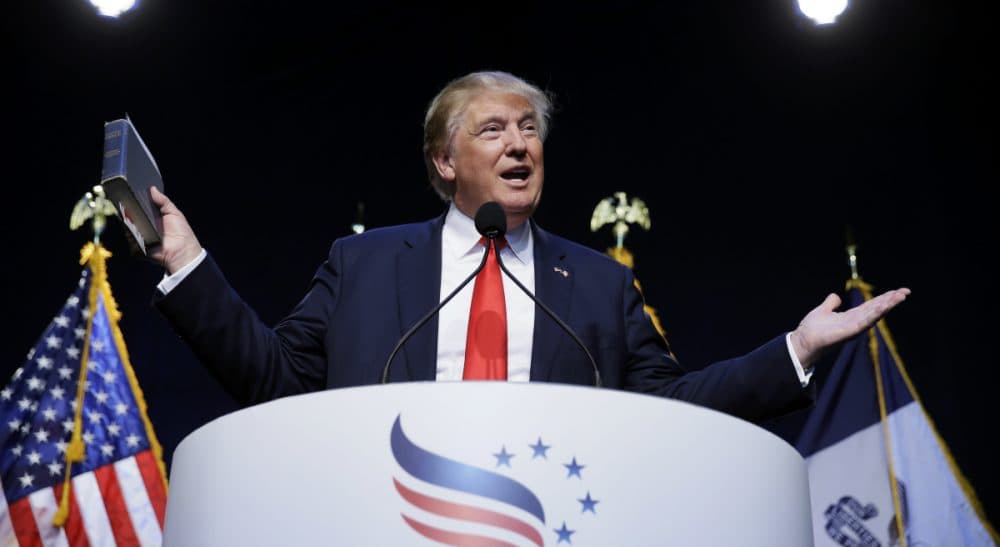 John Winters: "Today, we hear politicians talking about God one moment, while at the same time singing from a very different hymnal." Pictured: Republican presidential candidate Donald Trump holds a Bible as he speaks during the Iowa Faith & Freedom Coalition's annual fall dinner, Saturday, Sept. 19, 2015, in Des Moines, Iowa. (Charlie Neibergall/AP)