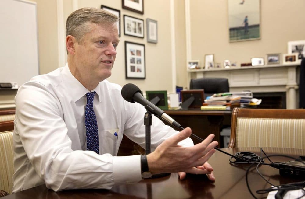Gov. Charlie Baker speaks to WBUR in his State House office in December. (Robin Lubbock/WBUR)