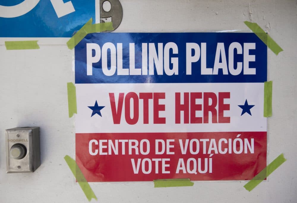A sign for a polling place is seen during the Super Tuesday primary voting at a polling place located at Fire Station #10 in Arlington, Virginia, March 1, 2016. (Saul Loeb/AFP/Getty Images)