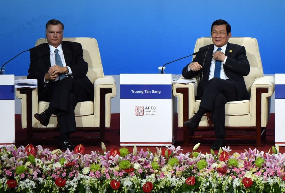 Vietnam's President Truong Tan Sang (R) speaks as Greg Boyce (L), chairman and CEO of Peabody Energy, looks on as they attend a dialogue at the APEC CEO Summit at the China National Convention Centre (CNCC) in Beijing on November 10, 2014, part of the Asia-Pacific Economic Cooperation (APEC) Summit. APEC Economic Leaders' Meetings and APEC summit is being held at Beijing's outskirt Yanqi Lake. (Wang Zhao/Getty Imgaes)