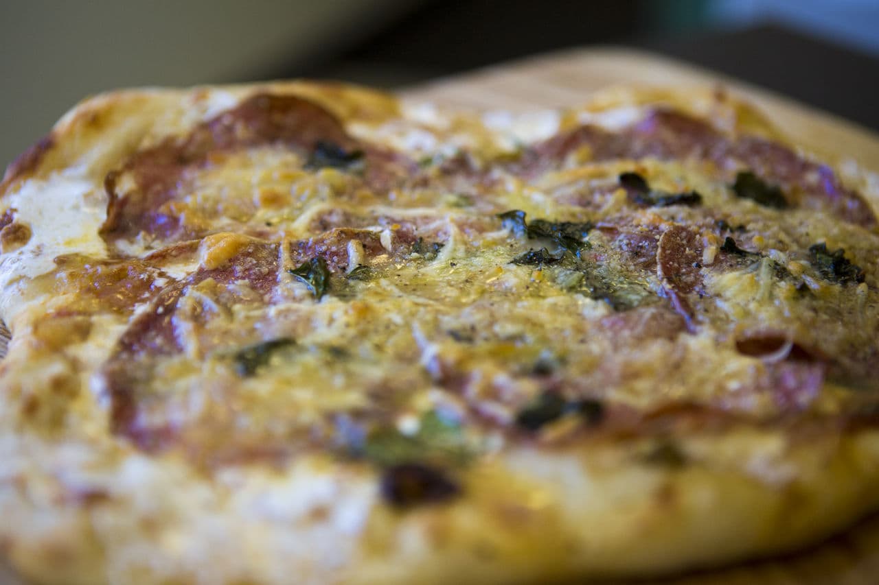 Pizza by Kathy Gunst: Tomato, Salami, Basil and White Anchovy. (Jesse Costa/WBUR)