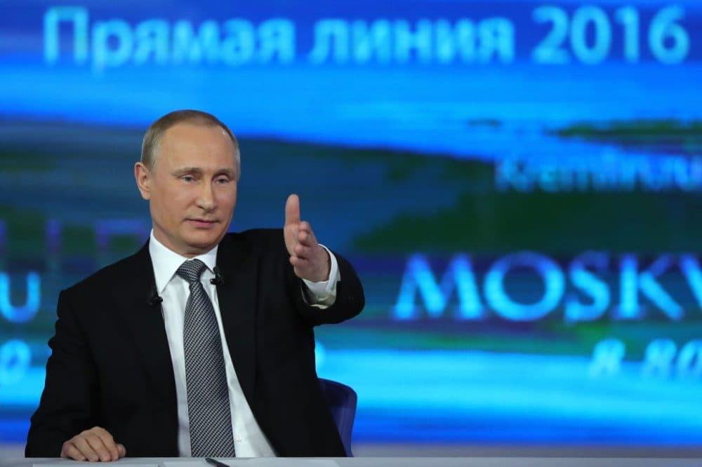 Russian President Vladimir Putin gestures while answering a question during his annual televised call-in show in central Moscow on April 14, 2016. (Mikhail Klimentyev/AFP/Getty Images)