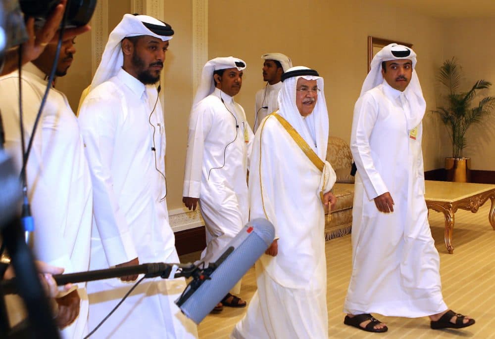 Saudi Arabia's minister of Oil and Mineral Resources Ali al-Naimi (center) arrives for the organization of Petroleum Exporting Countries (OPEC) meeting, in the Qatari capital Doha, on April 17, 2016. Top energy officials from some 15 countries including Saudi Arabia and Russia are at the Doha talks, amid reports a draft agreement was in the works to freeze output at January levels until at least October. (Karim Jaafar/AFP/Getty Images)