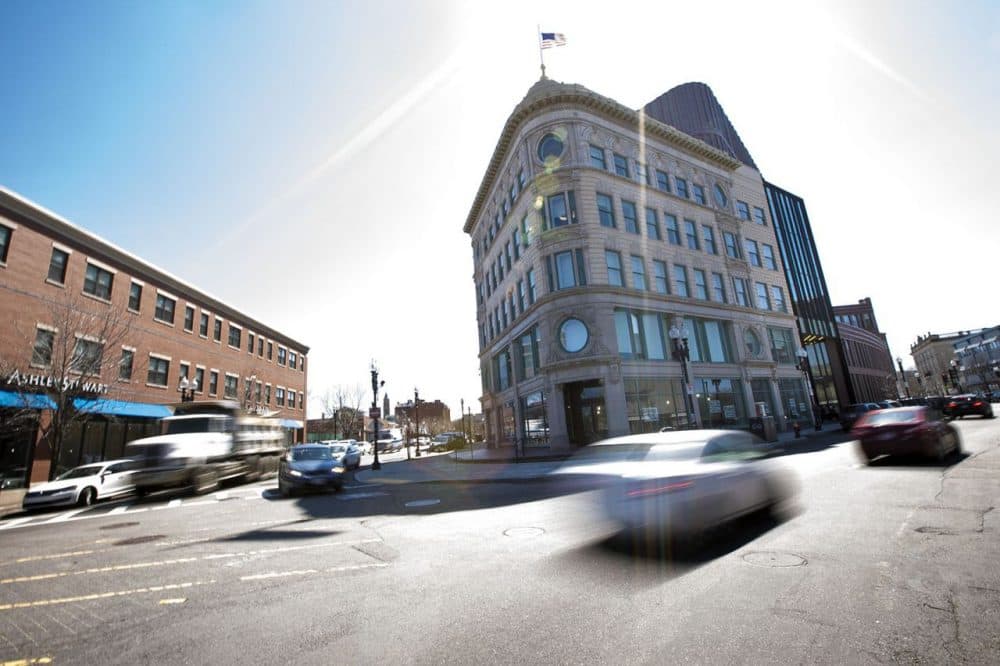 Mid-day traffic moving through Dudley Sq in Boston. (Jesse Costa/WBUR)