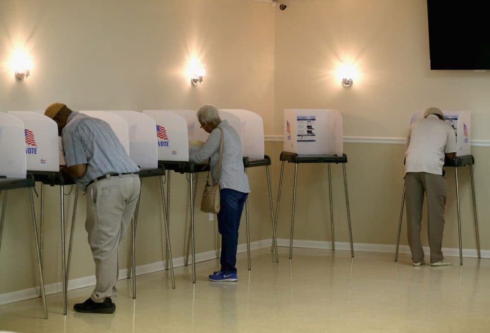 People vote at the Moose Lodge polling station, April 26, 2016 in White Plains, Maryland. (Mark Wilson/Getty Images)