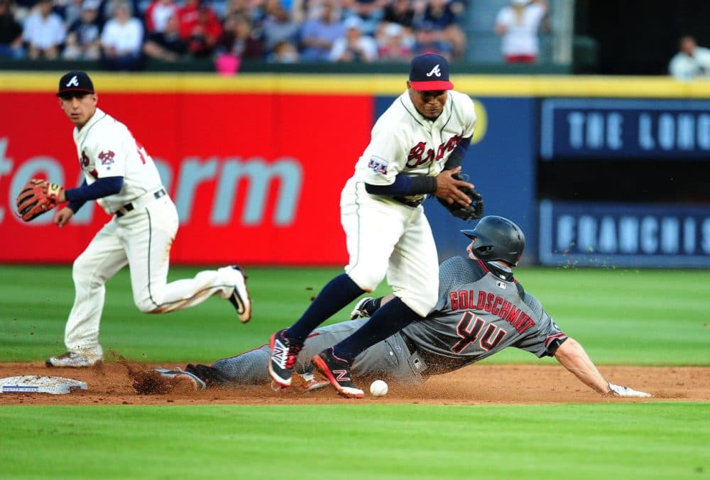 ATLANTA, GA - MAY 7: Paul Goldschmidt #44 of the Arizona Diamondbacks steals second base during the third inning against Erick Aybar #1 of the Atlanta Braves at Turner Field on May 7, 2016 in Atlanta, Georgia. (Photo by Scott Cunningham/Getty Images)