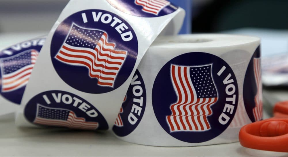 When it comes to the race for president, is America's glass half full -- or half empty? (Gerry Broome/AP)
