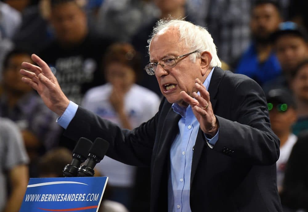 Democratic presidential candidate Bernie Sanders addresses a primary night election rally in Carson, California, May 17, 2016.
Sanders scored a decisive victory over Hillary Clinton in the Democratic primary in Oregon, boosting his argument for keeping his underdog campaign alive through the conclusion of the primary process. Several US networks called the Pacific northwest state for the liberal Sanders, who was leading the former secretary of state 53 percent to 47 percent. Earlier in the night, Clinton claimed victory in an extraordinarily tight race in the state of Kentucky. (ROBYN BECK/AFP/Getty Images)