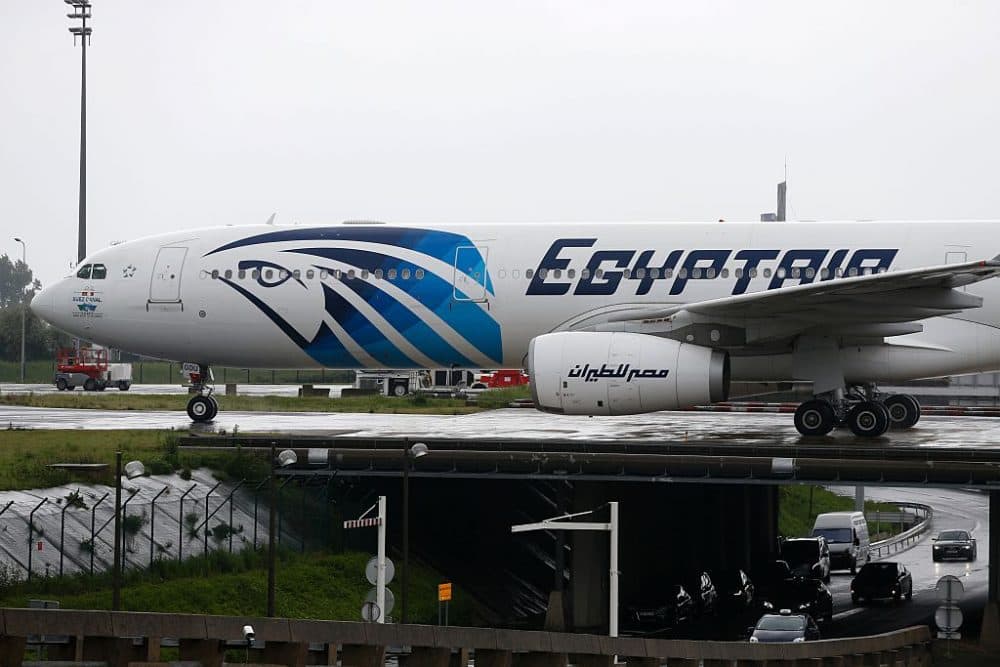 This picture taken on May 19, 2016, shows an Egyptair Airbus A330 from Cairo taxiing at the Roissy-Charles De Gaulle airport near Paris after its landing a few hours after the MS804 Egyptair flight crashed into the Mediterranean.
An EgyptAir flight from Paris to Cairo crashed into the Mediterranean on May 19, 2016, with 66 people on board, prompting an investigation into whether it was mechanical failure or a bomb. There were no immediate reports of the discovery of any debris in the area of sea between the Greek islands and the Egyptian coast where the plane vanished from radar screens. / AFP / THOMAS SAMSON (Photo credit should read THOMAS SAMSON/AFP/Getty Images)