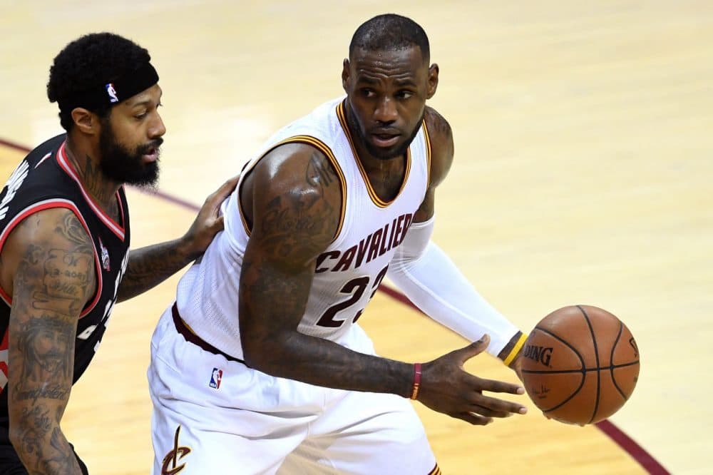 LeBron James #23 of the Cleveland Cavaliers handles the ball in the second quarter against James Johnson #3 of the Toronto Raptors in game one of the Eastern Conference Finals during the 2016 NBA Playoffs at Quicken Loans Arena on May 17, 2016 in Cleveland, Ohio. (Jason Miller/Getty Images)