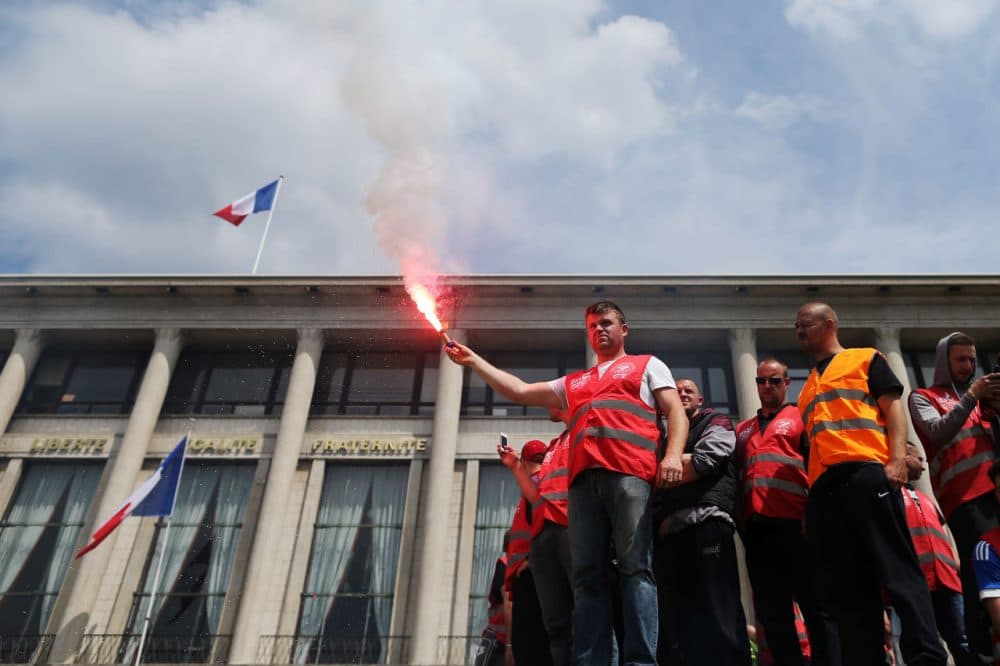 People demonstrate in Le Havre northwestern France on May 26, 2016 to protest against the government's proposed labour reforms. (Charly Triballeau/AFP/Getty Images)
