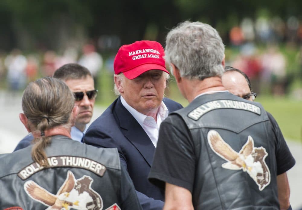 Republican presedential candidate Donald Trump shakes hands with veterans during the annual Rolling Thunder "Ride for Freedom" parade ahead of Memorial Day in Washington, DC, on May 29, 2016. (Andrew Caballero-Reynolds/AFP/Getty Images)