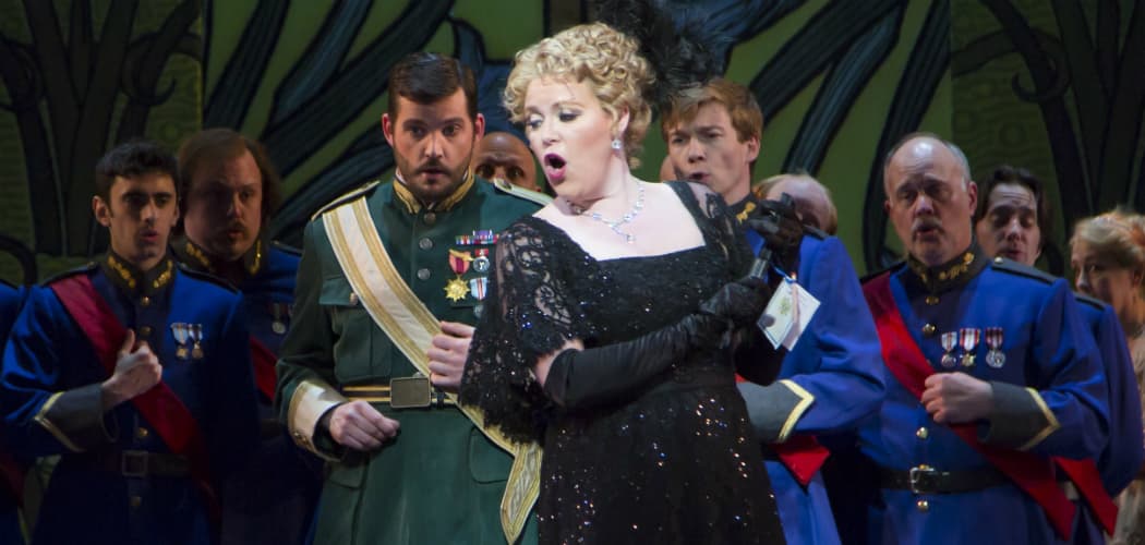 Erin Wall, as Hanna Glawari, surrounded by the ensemble of Boston Lyric Opera’s production of "The Merry Widow." (Courtesy of T Charles Erickson/BLO)