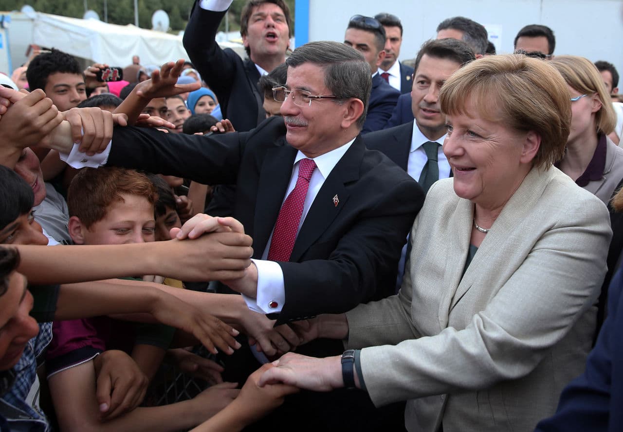 German Chancellor Angela Merkel, pictured here with Turkish Prime Minister Ahmet Davutoglu, visited the Nizip camp on April 23, 2016. (Hakan Goktepe/AP)