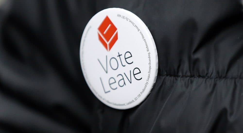 Phil Budden: "Make no mistake: Britain’s upcoming sovereign decision matters greatly to those in the U.S. Here’s why." A Pro-Brexit campaigner hands out leaflets at Liverpool Street station in London. (Frank Augstein/AP)