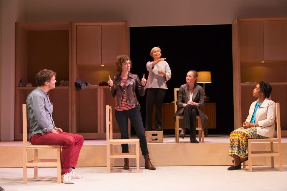 A scene from "I Was Most Alive With You," which features shadow interpreters to create a richer experience for deaf audiences. (Courtesy The Huntington Theatre Company)